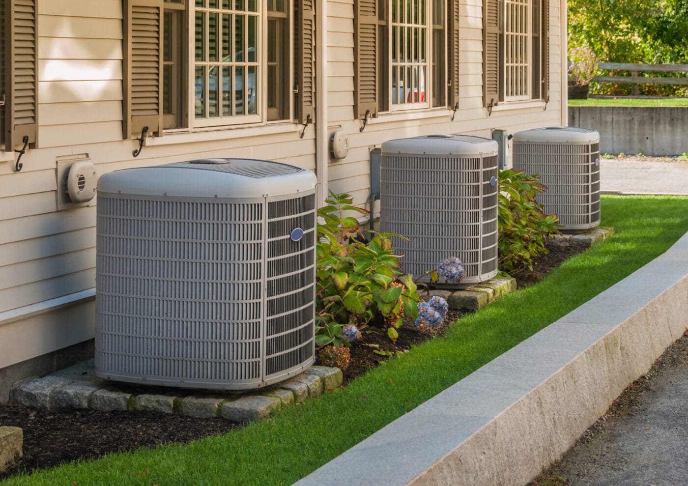 Line of HVAC units with nice landscaping
